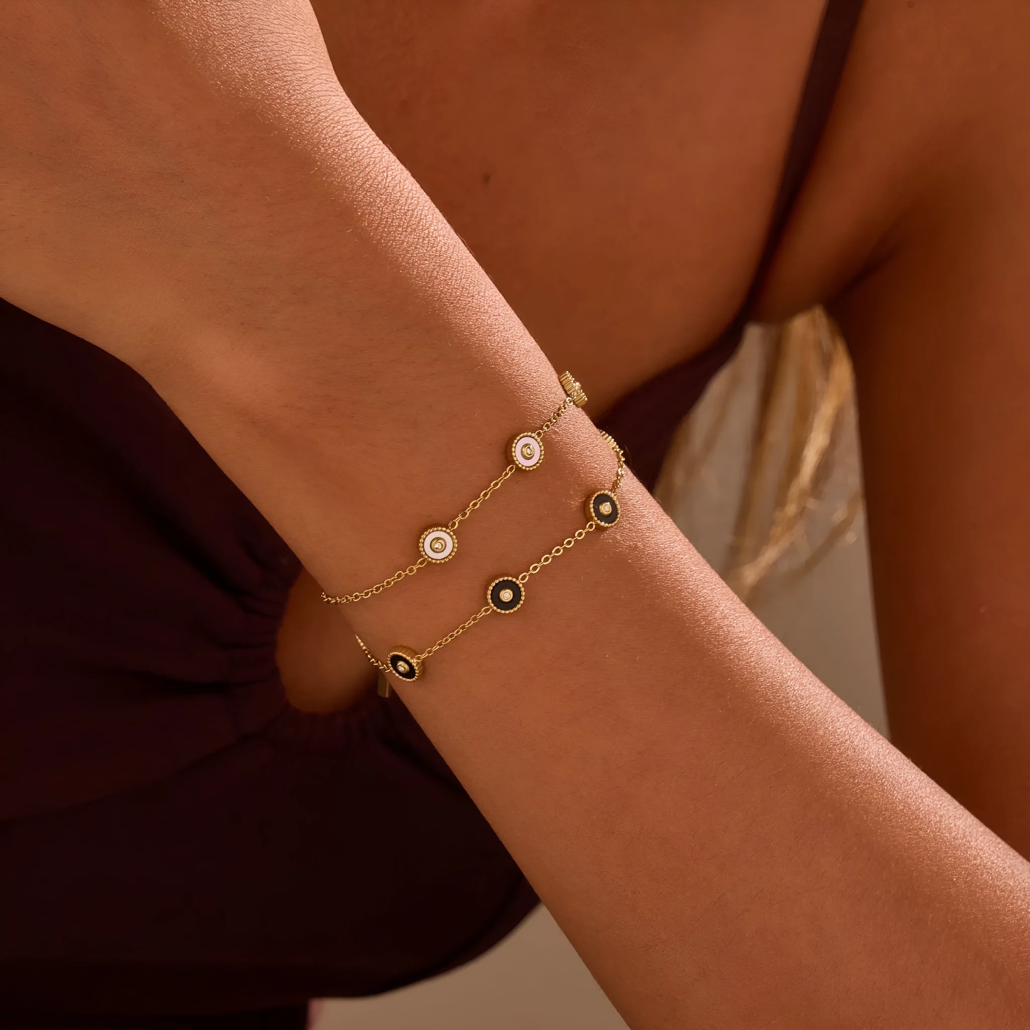 Geometric fritillary pattern stainless steel bracelet with 18K gold plating and matching necklace