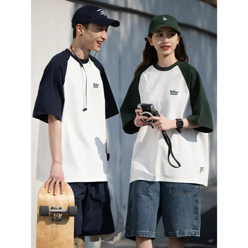Men's blue Japanese raglan sleeve T-shirt with loose pullover fit on hanger