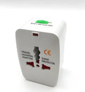 Universal travel adapter plug showing multiple international plug configurations including UK, EU, Australian, Chinese and US compatibility