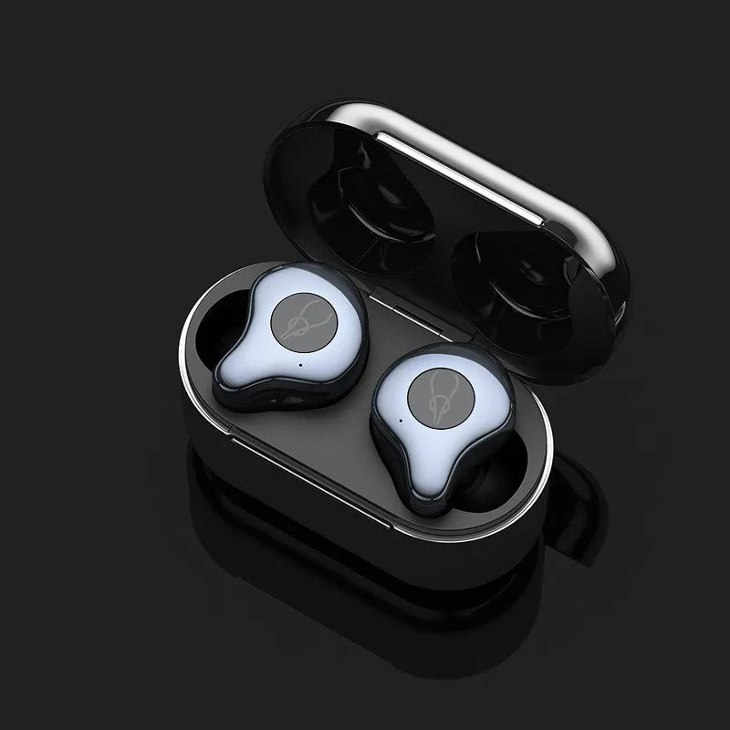 Coffee coloured TWS Bluetooth wireless earbuds sitting in their charging case.
