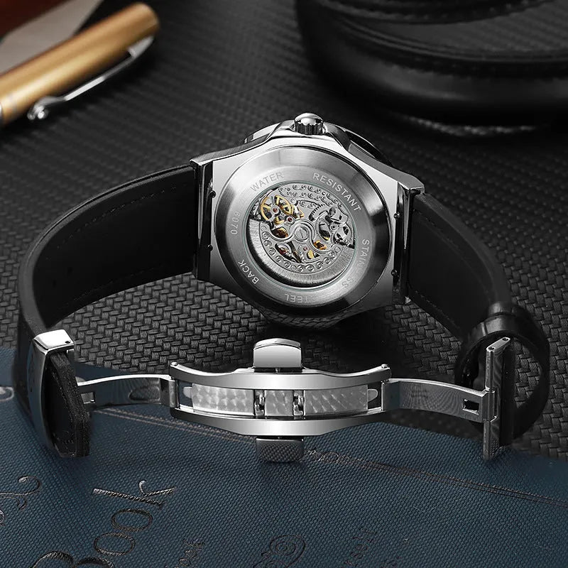 Men's automatic mechanical watch with diamond studding and hollow movement design on wrist
