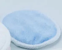 Velvet makeup remover pads in red and blue colours showing soft texture and circular 8cm size