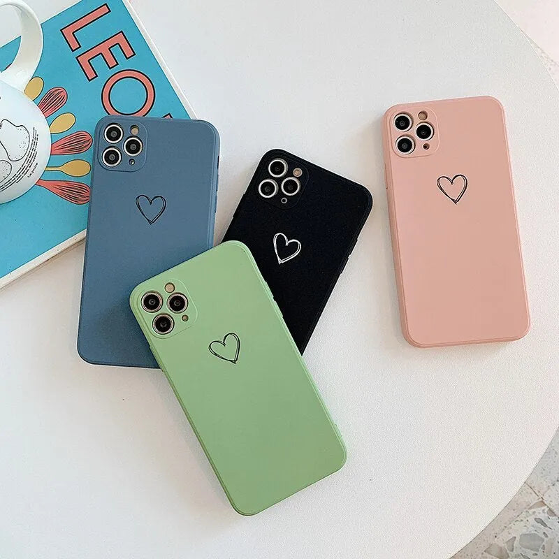 Solid colour silicone TPU phone case for Apple iPhone on a table.