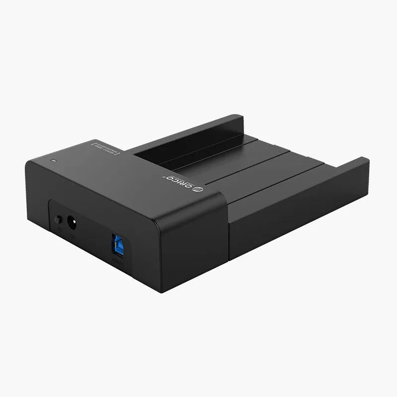 Black plastic hard disk enclosure for 2.5-inch and 3.5-inch SATA drives with USB cable