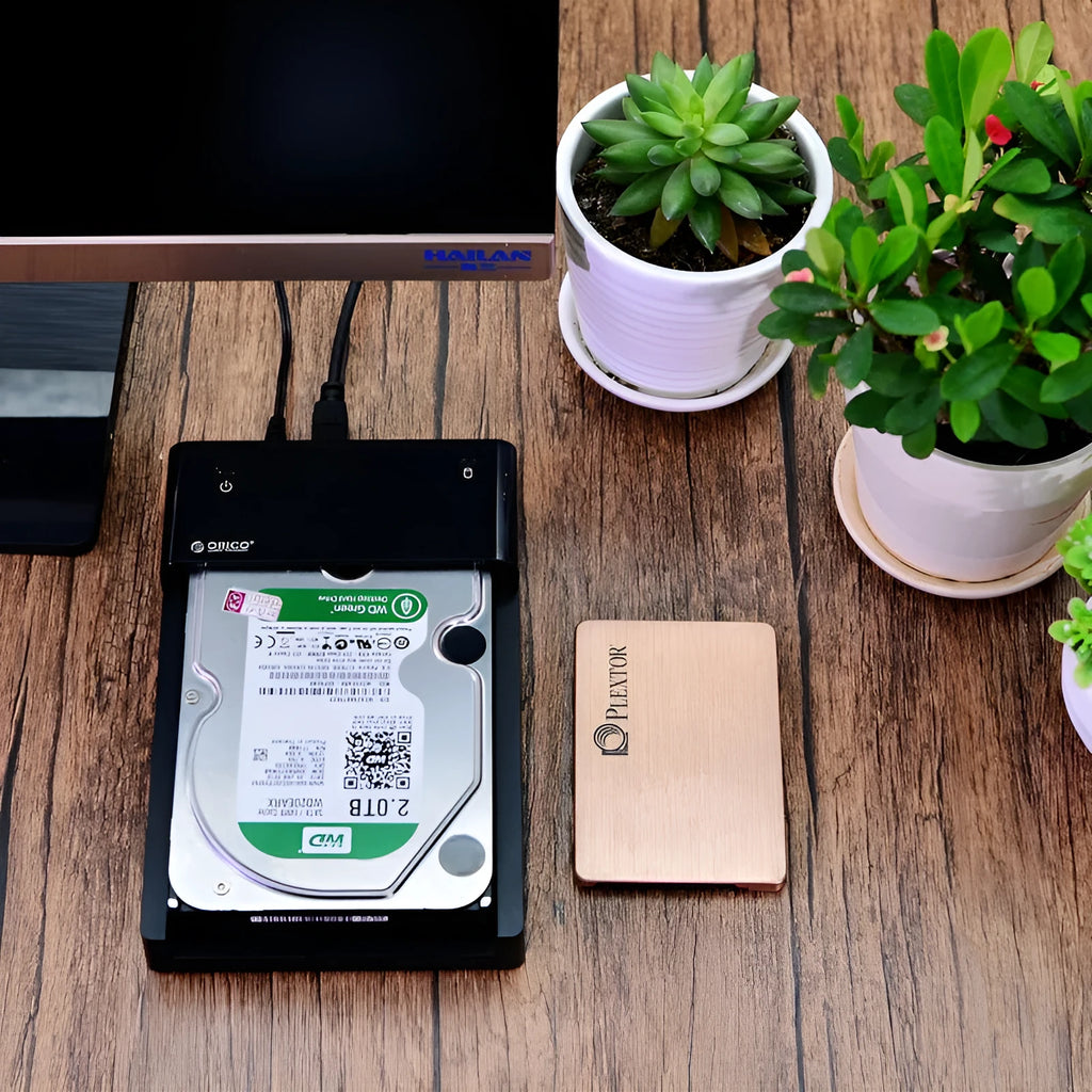 Black plastic hard disk enclosure for 2.5-inch and 3.5-inch SATA drives with USB cable