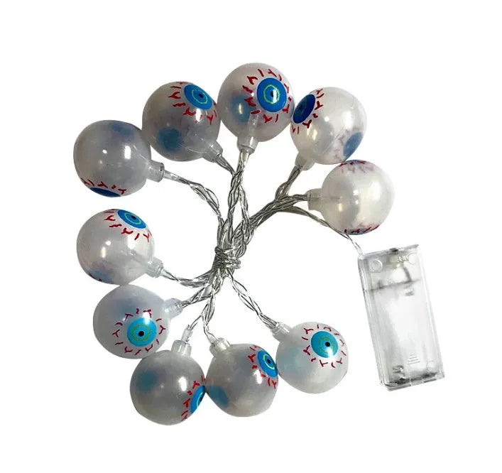 Halloween battery LED string lights showing bat, pumpkin, ghost and spider shapes on a 1.2 metre white wire.