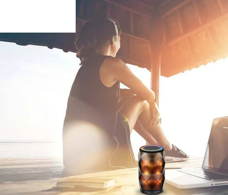 Black crystal diamond-cut Coke can shaped Bluetooth speaker lantern with colourful LED lighting.