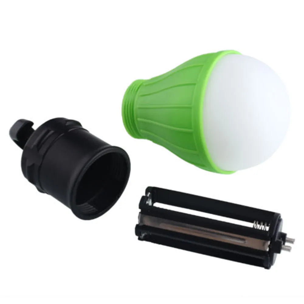 Blue portable LED camping light with a black hanging hook, showing its compact size.