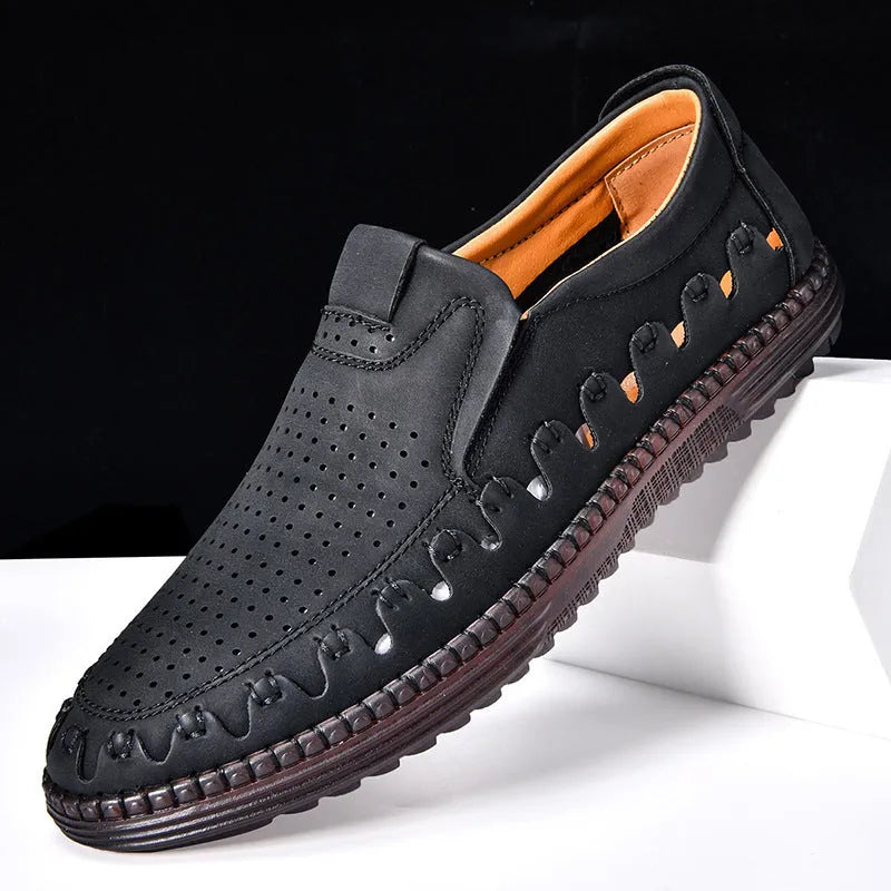 Men's brown casual slip-on shoes with round toe, hollowed detail, and sewn sole on a neutral background.