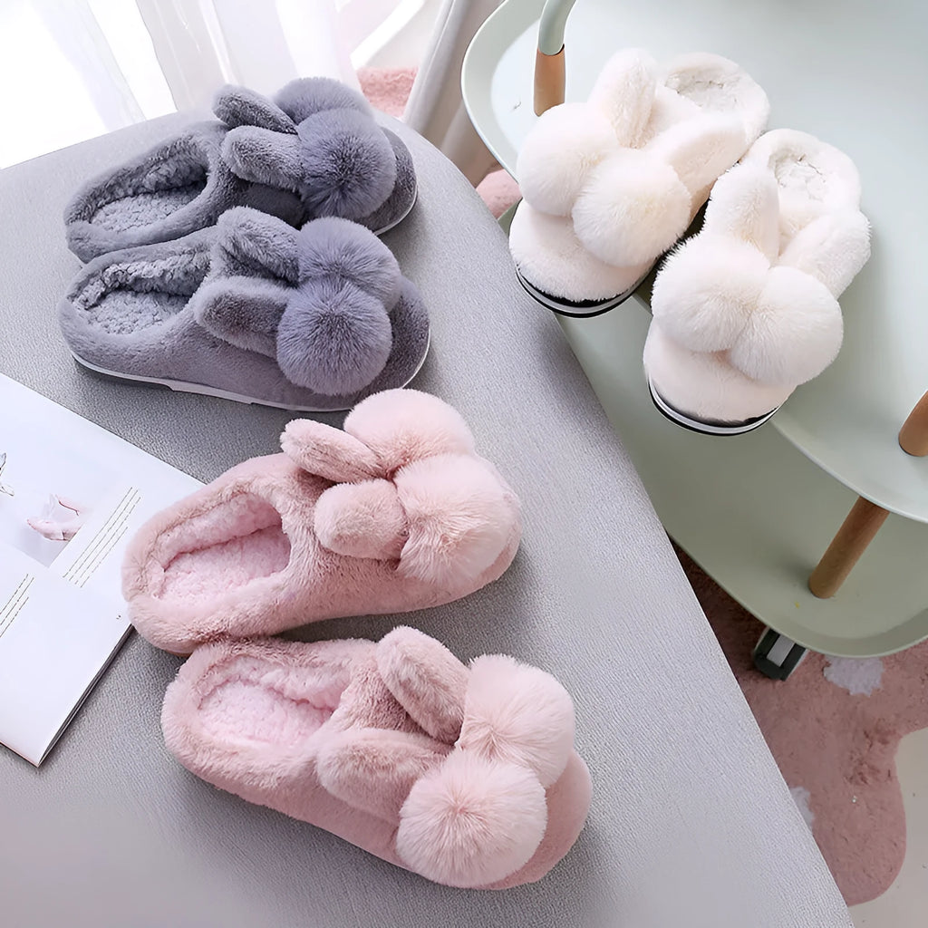 Women's high upper fluffy bunny slippers in rabbit fur, shown in creamy white colour with a low heel.