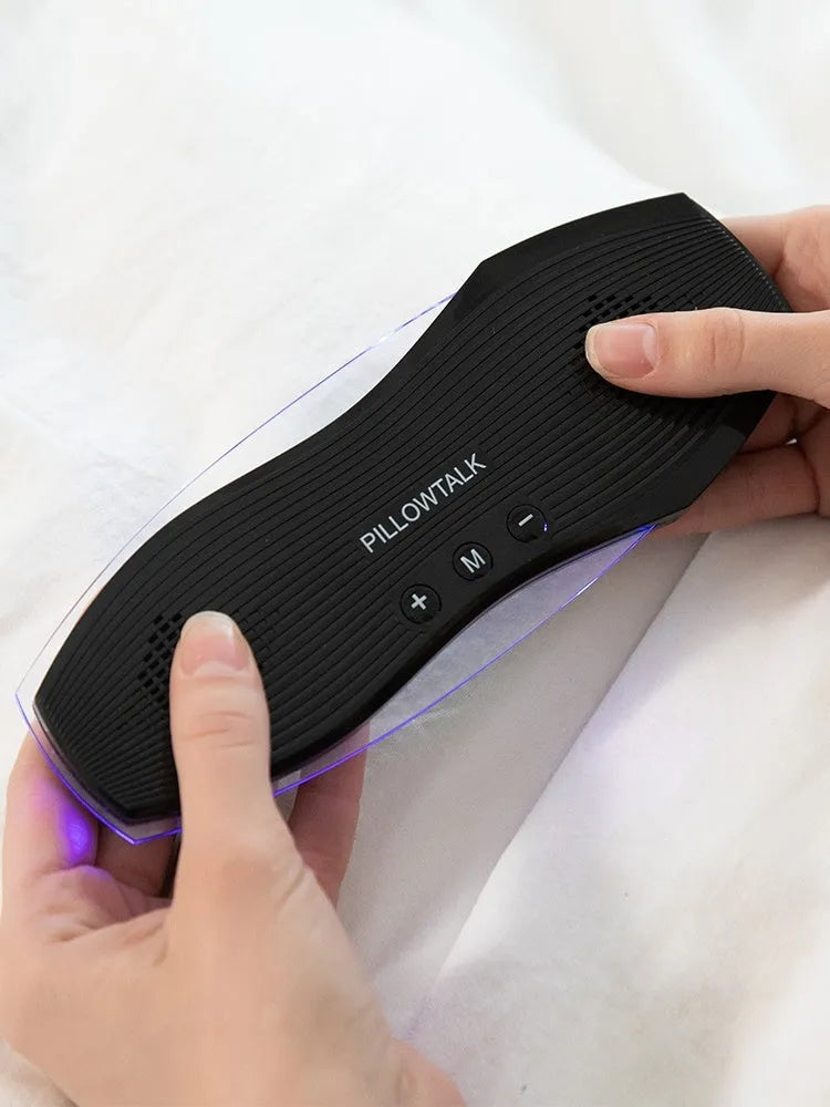 Black true wireless headphones with soft silicone earbuds and compact USB charging case