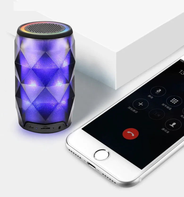 Black crystal diamond-cut Coke can shaped Bluetooth speaker lantern with colourful LED lighting.