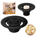 Four black plastic steamed bun moulds for shaping baozi, dumplings, and shumai