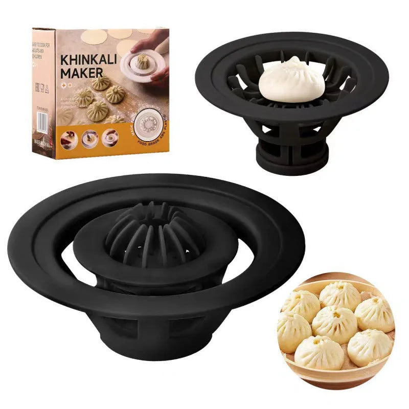 Four black plastic steamed bun moulds for shaping baozi, dumplings, and shumai