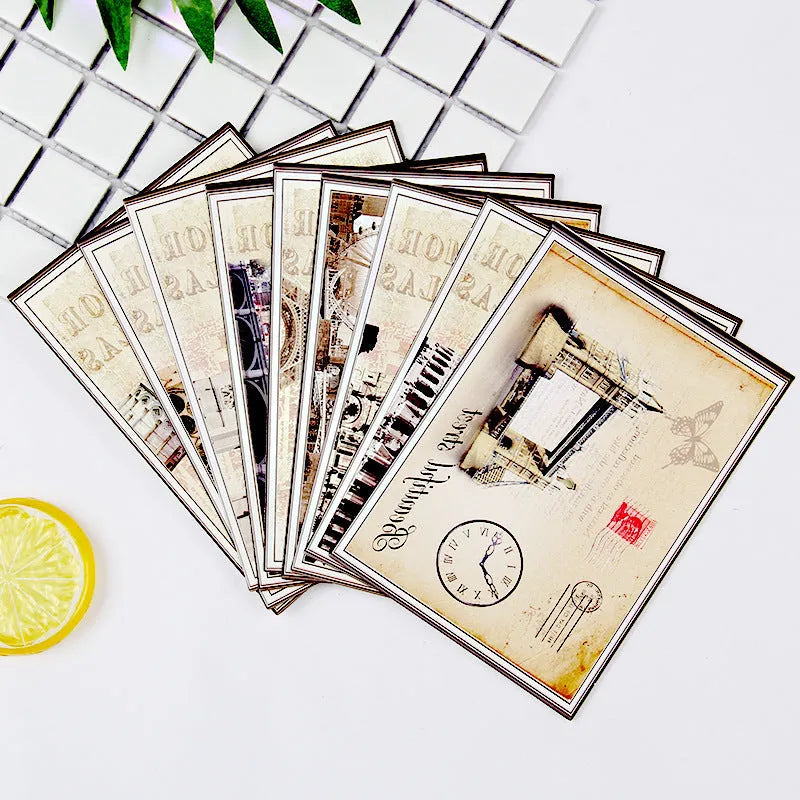 Set of nine Japanese minimalist cartoon postcards showing retro illustrations of the Paris Tower and other historic buildings.