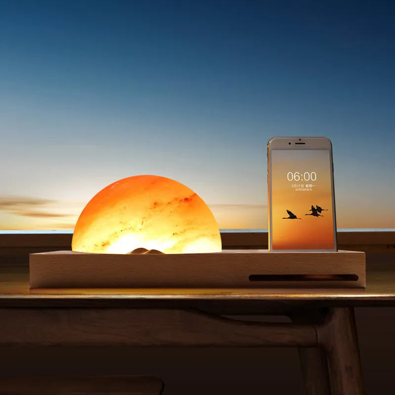 Sunrise Oriental wooden base table lamp with natural salt shade and built-in wireless phone charger.