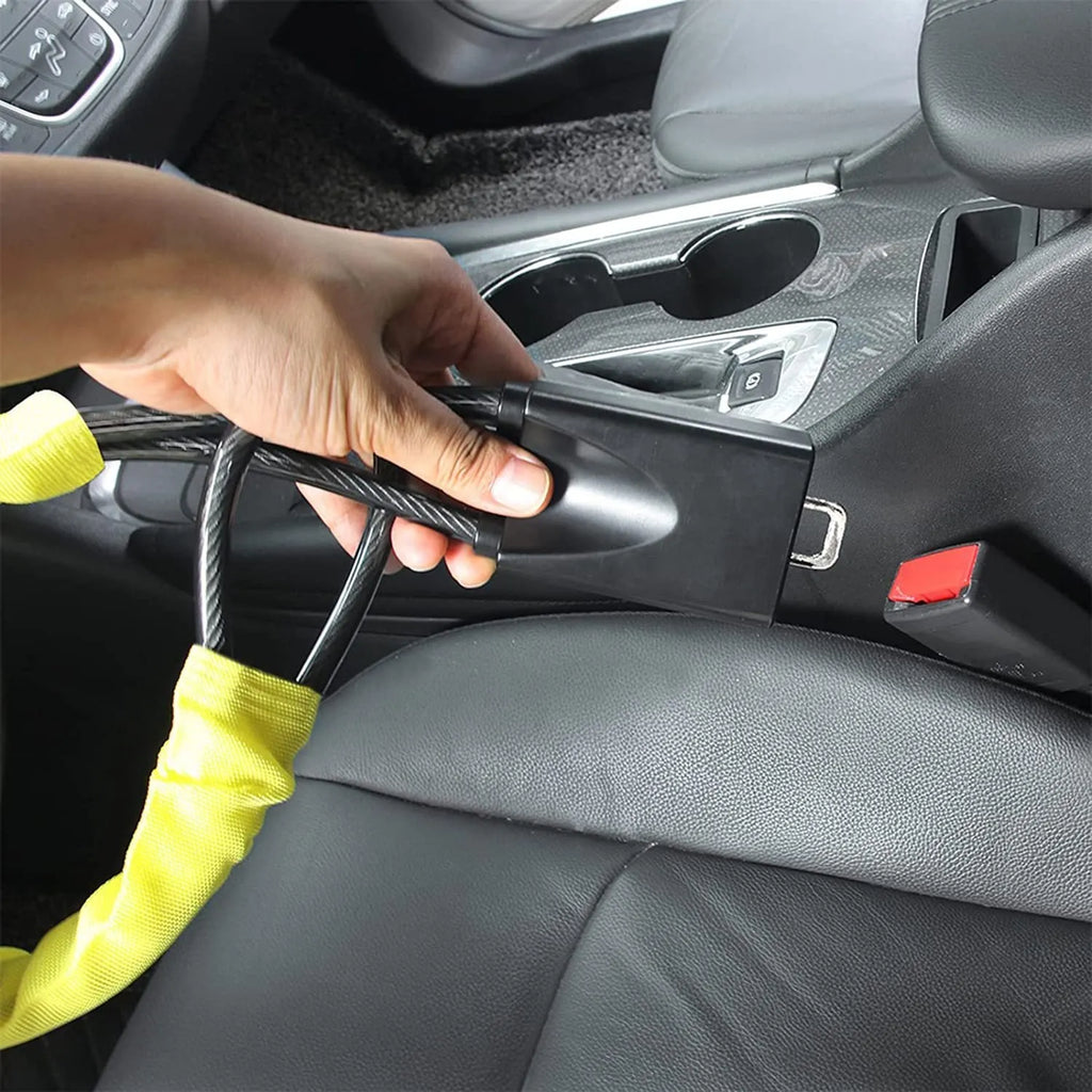 Red iron car steering wheel lock for General Motors vehicles showing wire rope design and copper lock core