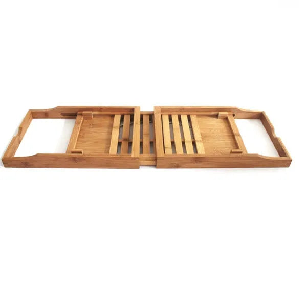 Bamboo single-tier desktop storage rack for bathroom organisation next to a bathtub.