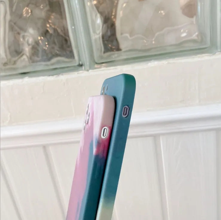 Soft silicone iPhone case with blue and purple abstract oil painting gradient geometry pattern.
