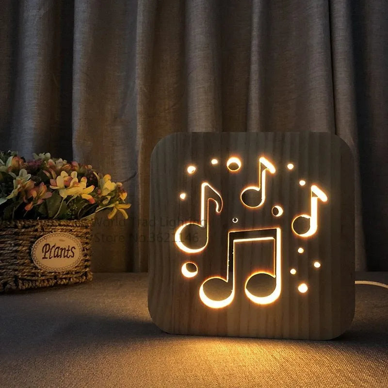 Square wooden USB LED atmosphere light with laser-cut design glowing warm white.