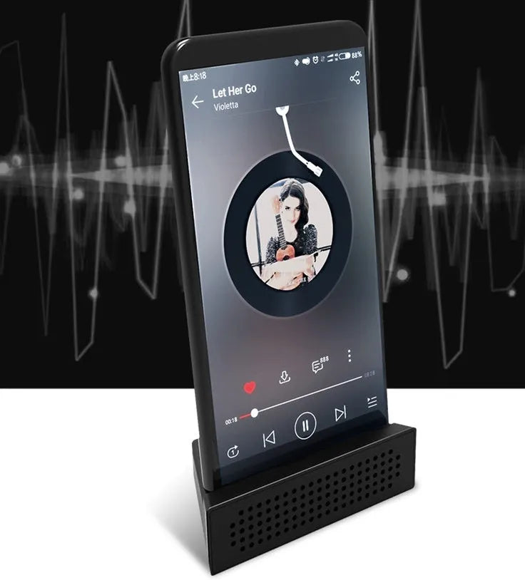 Portable iPhone speaker amplifier stand in ABS plastic showing phone in horizontal position