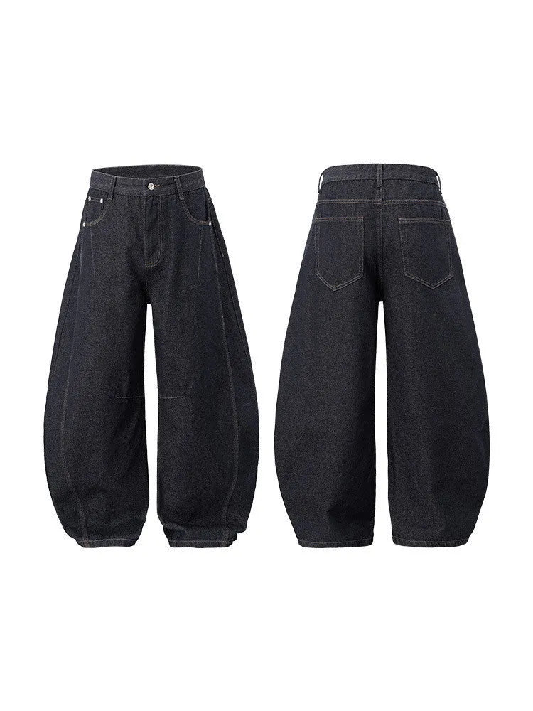 Men's wide leg denim trousers in original cow colour showing relaxed fit and mid waist construction