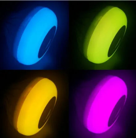 White Bluetooth speaker smart LED bulb with E27 base and remote control.
