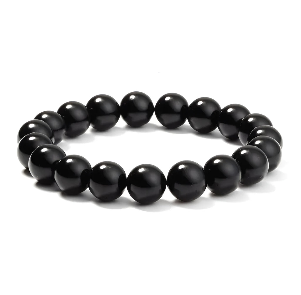 A geometric black agate bead stretch bracelet with 8mm stones on an elastic cord.