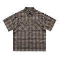 Men's black and brown plaid short sleeve shirt with embroidered letter on lapel