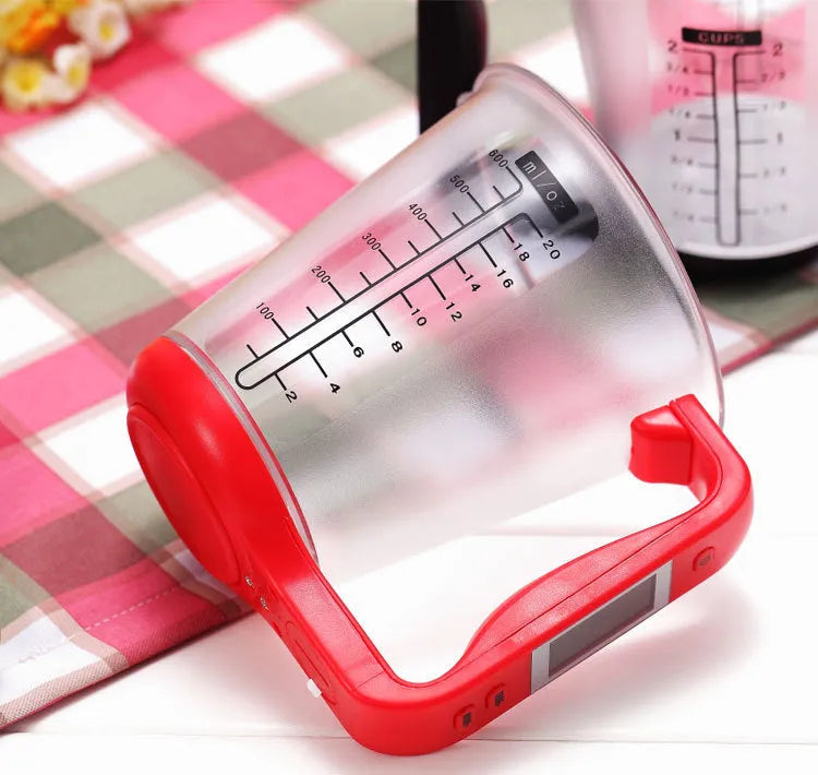 Green digital kitchen measuring cup scale with LCD display in handle