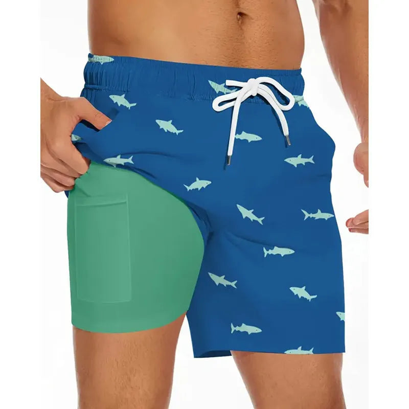 Man wearing loose light blue polyester beach pants on shore