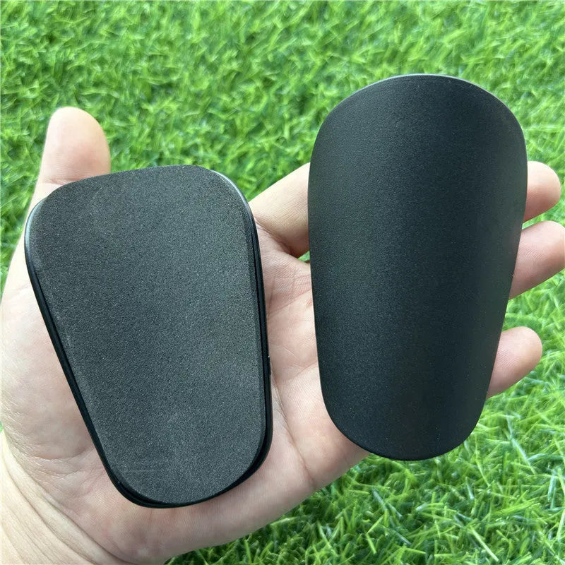 Extra small mini football shin guards in 8x5cm plastic construction