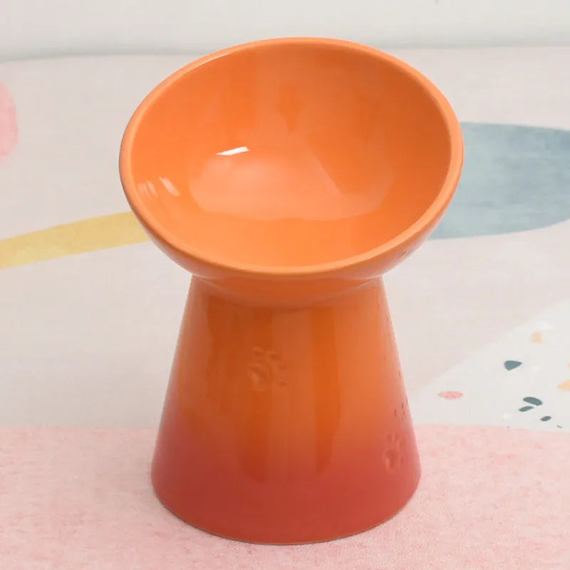 Ceramic pet bowl with high foot design showing anti-tumble stability feature