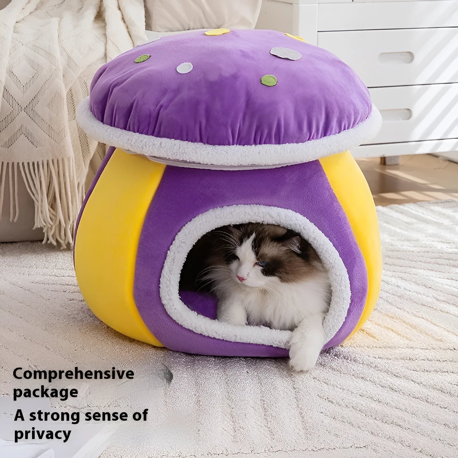 Purple mushroom-shaped plush cat nest with a detachable blanket, shown on a wooden floor.