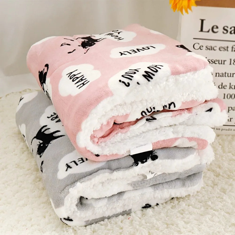 Pink lambskin pet blanket with cute cartoon design made from flannel and cashmere