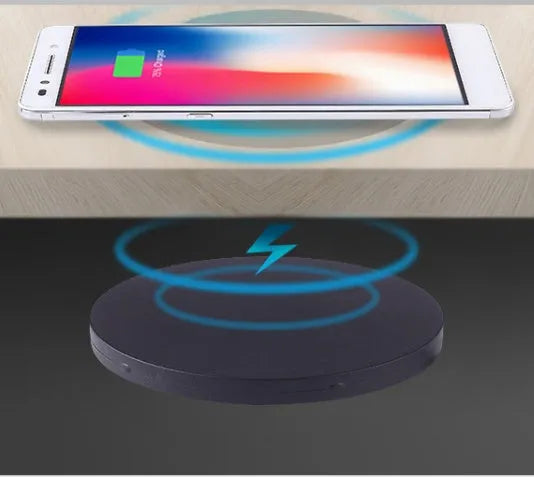 60mm round wireless charging pad for embedding into furniture surfaces with USB cable connection
