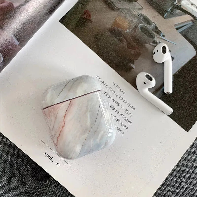 White marble hard PC protective case for AirPods 1 and 2 charging box.