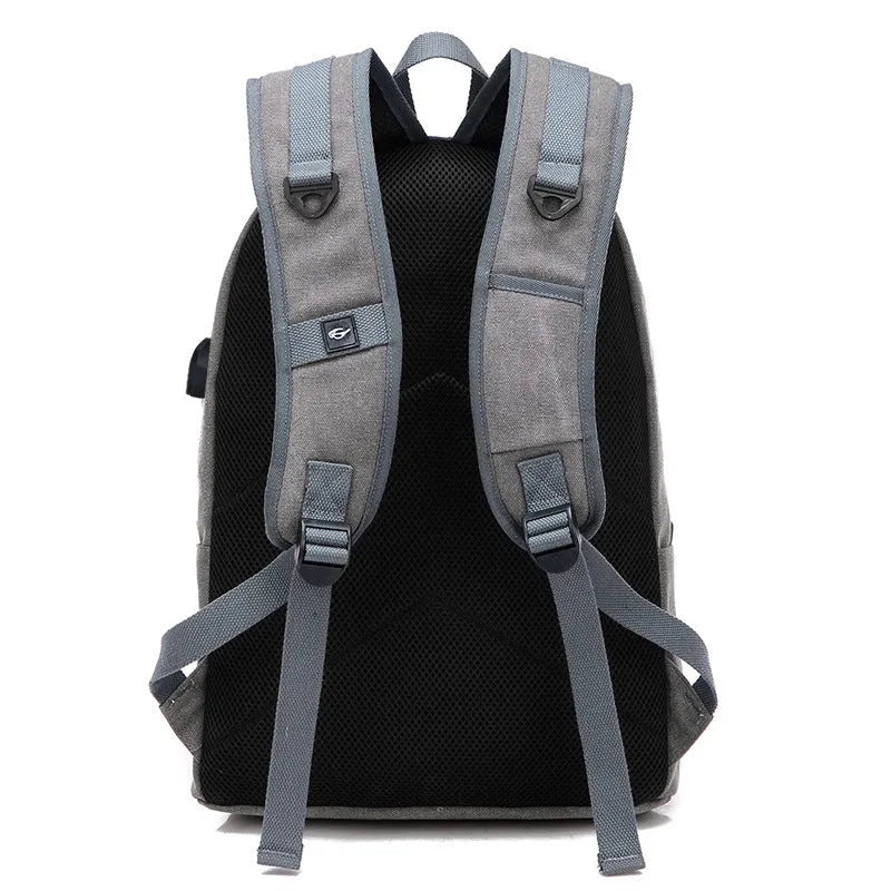 Canvas backpack with USB charging port and laptop compartment in multiple colour options