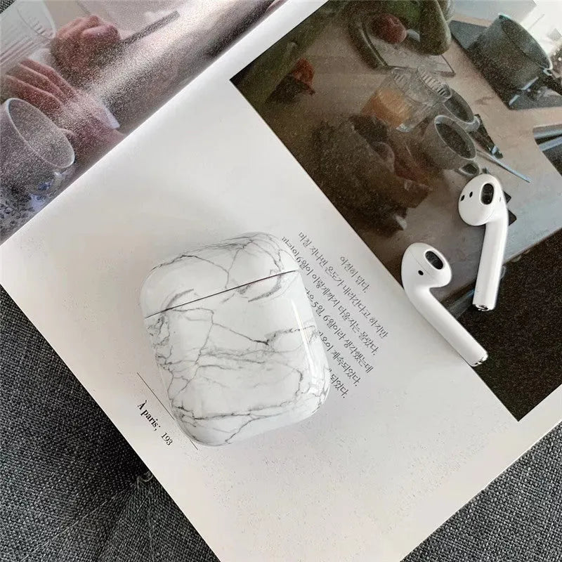 White marble hard PC protective case for AirPods 1 and 2 charging box.