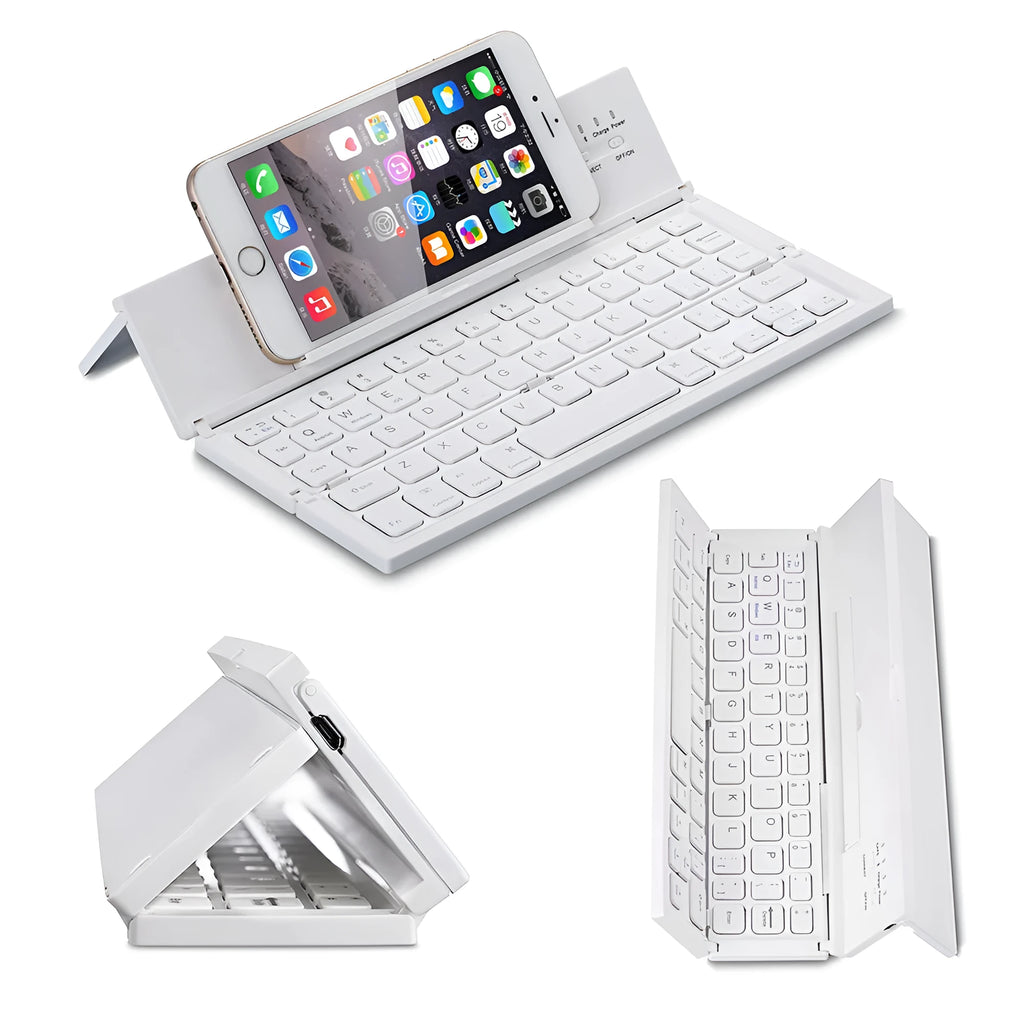 Black folding Bluetooth keyboard with aluminium bottom next to tablet