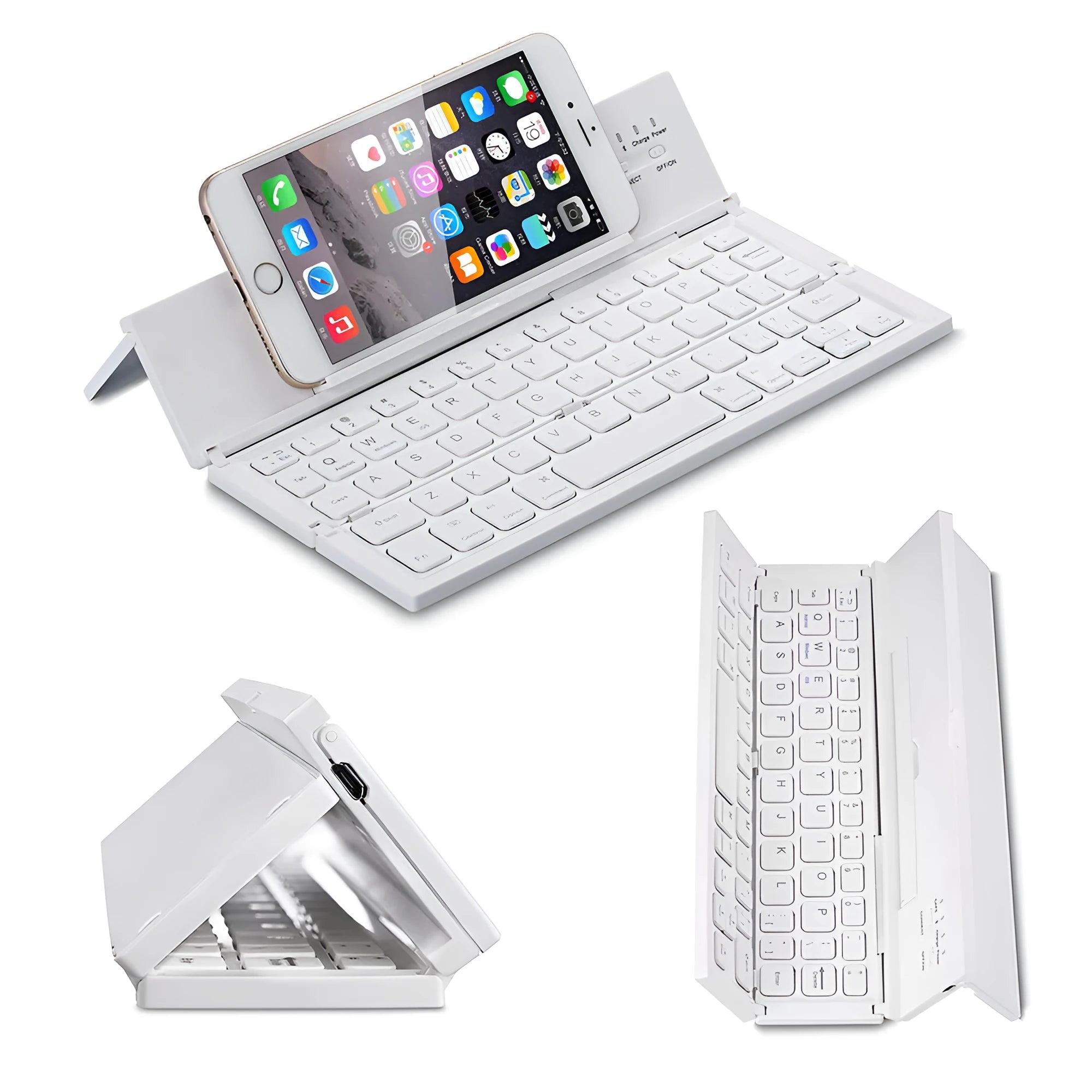 Black folding Bluetooth keyboard with aluminium bottom next to tablet