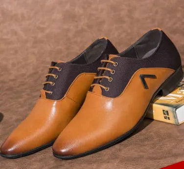 Men's black Oxford shoes with a low upper, brogue detailing, and a rubber sole.