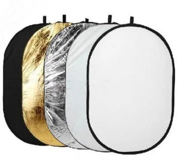 5-in-1 collapsible photography light reflector with gold, silver, white, black, and translucent surfaces.
