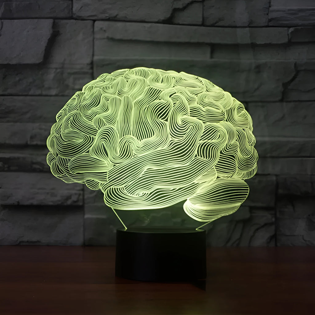 3D brain illusion desk lamp with colour-changing LED lights and remote control on wooden surface