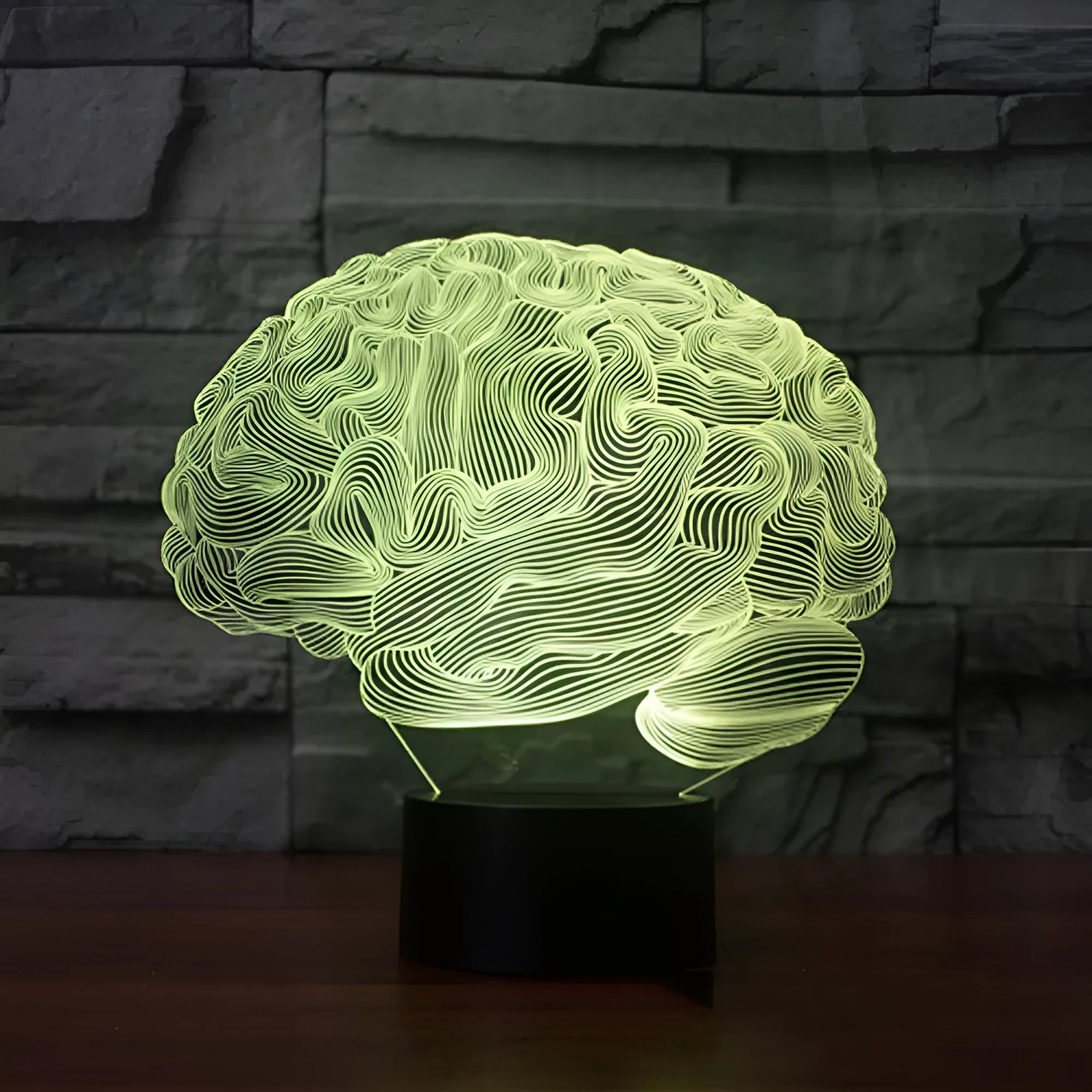 3D brain illusion desk lamp with colour-changing LED lights and remote control on wooden surface