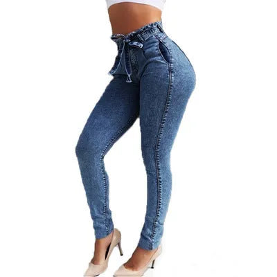 Women's fringed jeans in distressed Cowboy denim with frayed hem detailing in grey, dark blue, or light blue