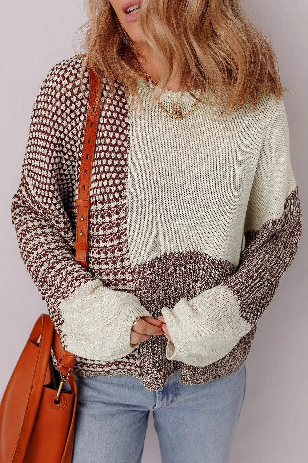 Dark khaki loose drop shoulder sweater with colour block panels and a back tie detail.