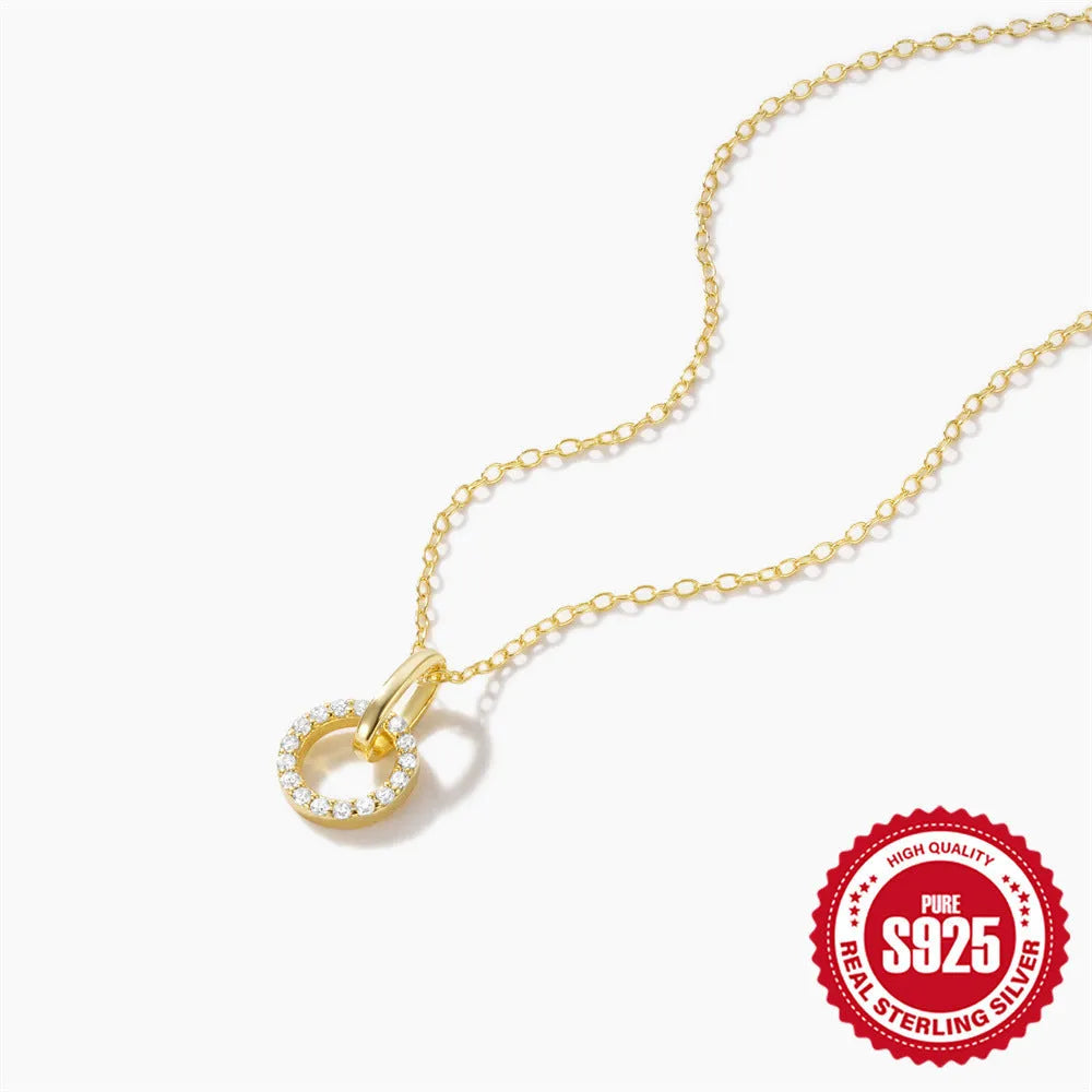 Gold-coloured S925 sterling silver clavicle necklace with a geometric interlocking zircon pendant on an adjustable chain.