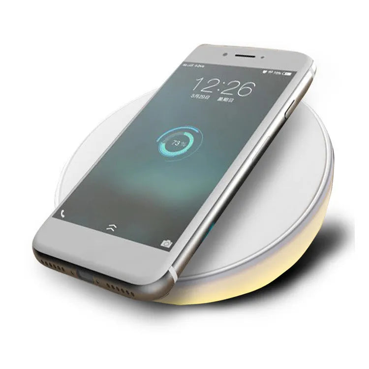 White Qi wireless charging pad with LED digital clock display and three control buttons