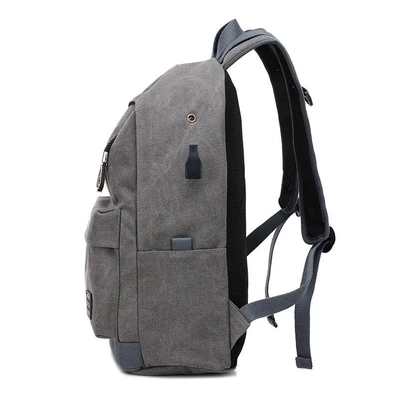 Canvas backpack with USB charging port and laptop compartment in multiple colour options